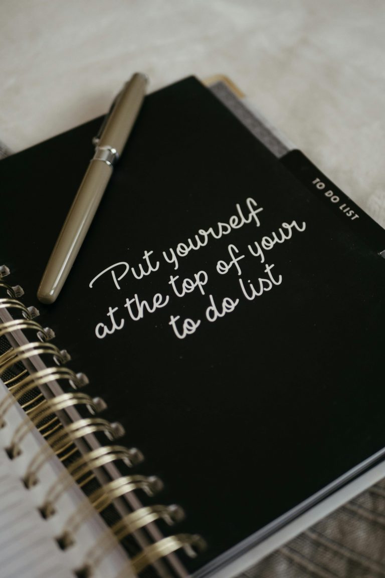 Notebook with the quote 'Put yourself at the top of your to-do list', inspiring self-care and wellness.