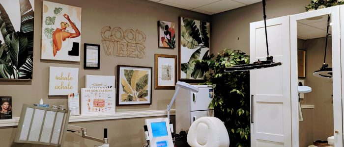Balance Skin & Wellness treatment room in San Antonio, featuring inclusive skincare tools, cozy decor, and empowering artwork for melanin-safe aesthetic care.