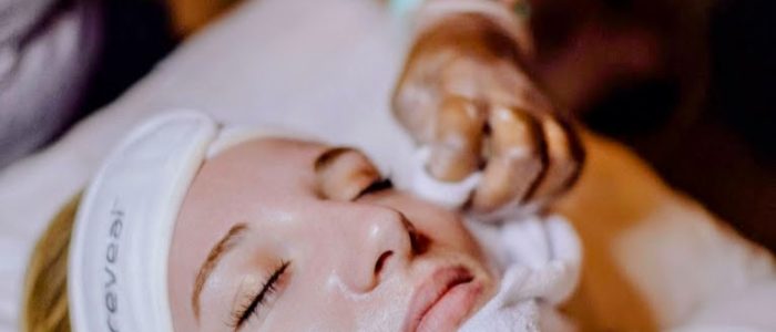 Client receiving a professional facial treatment at Balance Skin & Wellness, a Black-owned med spa in San Antonio offering inclusive skincare for all tones.